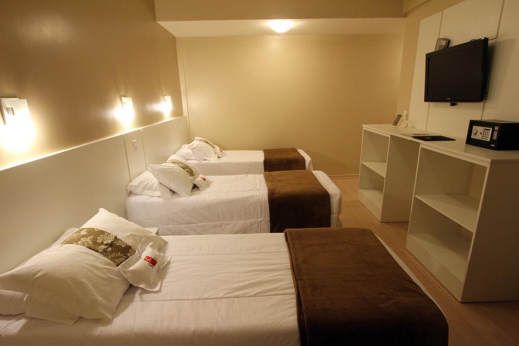 פלוטאס Hotel Curi Executive חדר תמונה